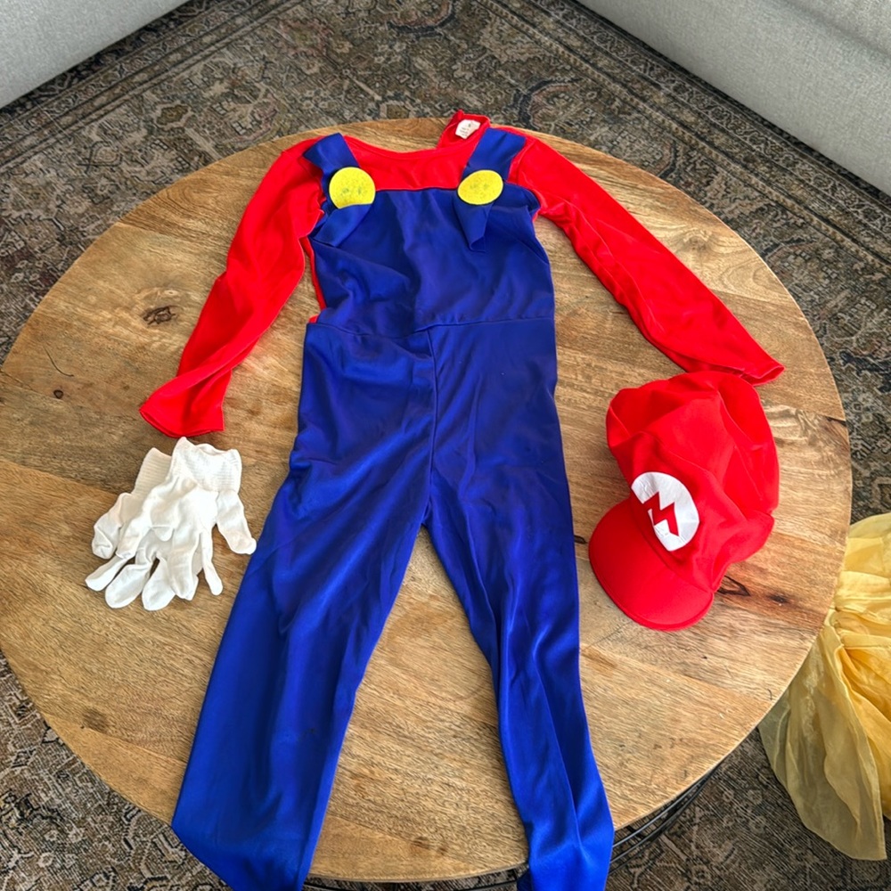 Mario costume in very good condition worn once all you need is a mustache!